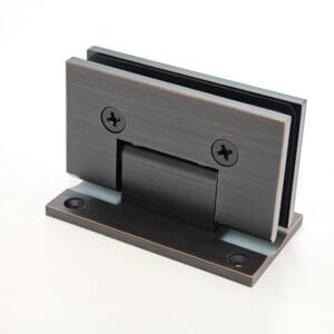 Metal bracket with screws on white background.