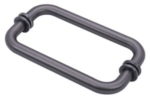 A black rectangular door handle with rounded edges.