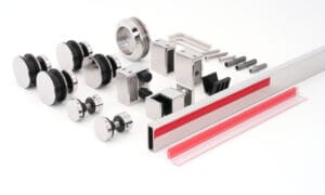 Various mechanical parts and components arranged on a white surface.