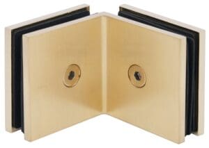 Gold-colored metal corner bracket with screws for structural support.