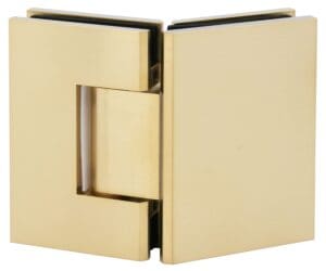 A shiny gold metal hinge with a modern design.
