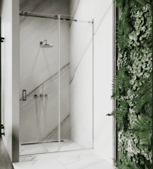 Modern glass shower enclosure with a green living wall beside it.