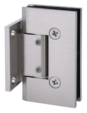 Close-up of a metal door hinge with screws attached to a door frame.