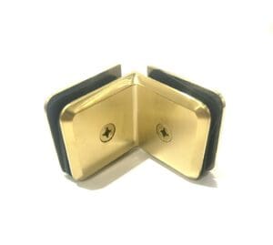 Gold corner bracket with screws, white background.
