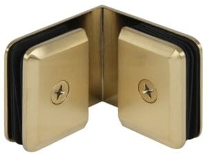 Gold corner bracket with screws and pads.