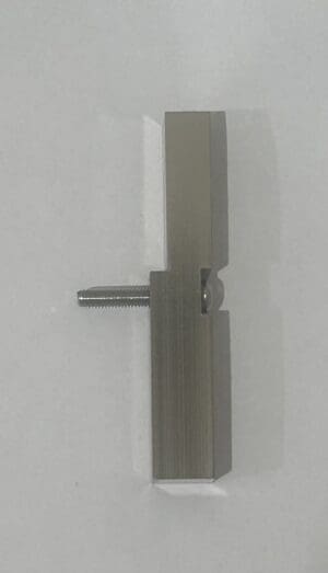 Metallic mechanical part with threaded screw.